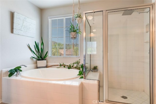 4765 Falconview Ct, Fontana, CA 92336 - bathroom with a bath and a stall shower