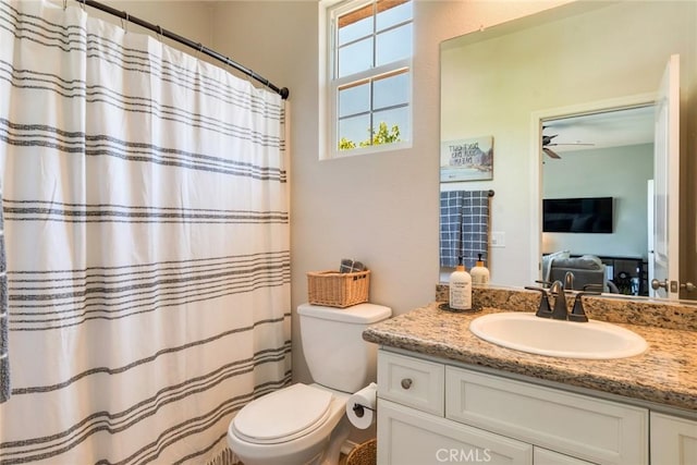 4765 Falconview Ct, Fontana, CA 92336 - full bath featuring vanity, ceiling fan, and a shower with shower curtain