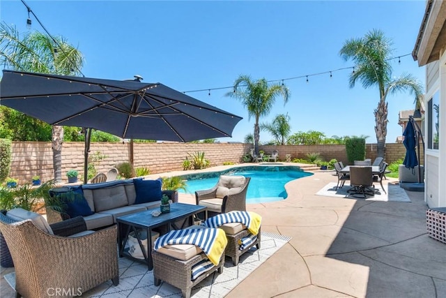 4765 Falconview Ct, Fontana, CA 92336 - view of pool with outdoor lounge area, a fenced backyard, a patio area, and outdoor dining area
