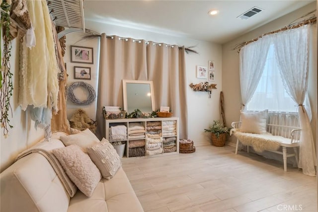 4765 Falconview Ct, Fontana, CA 92336 - living area with wood finished floors and recessed lighting
