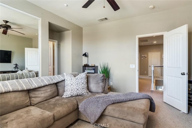 4765 Falconview Ct, Fontana, CA 92336 - living room with a ceiling fan and light colored carpet
