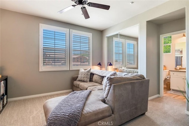 4765 Falconview Ct, Fontana, CA 92336 - living area with light carpet and ceiling fan