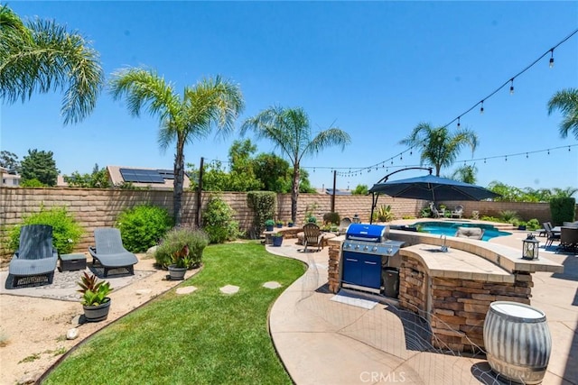 4765 Falconview Ct, Fontana, CA 92336 - fenced backyard featuring a patio and a fire pit