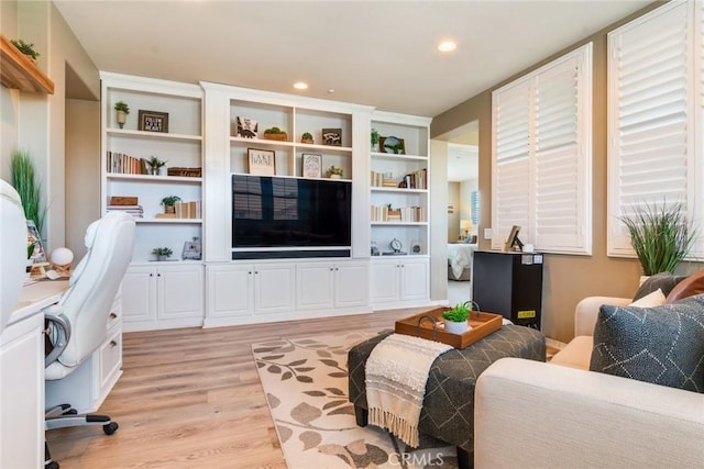 4765 Falconview Ct, Fontana, CA 92336 - living area featuring light wood-style floors, an office area, and recessed lighting