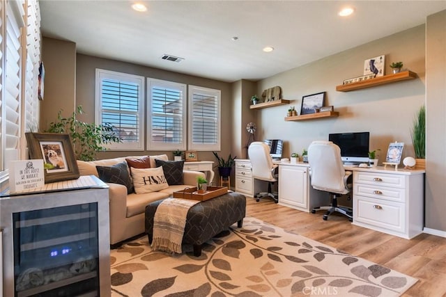 4765 Falconview Ct, Fontana, CA 92336 - office space with beverage cooler, light wood-style floors, and recessed lighting