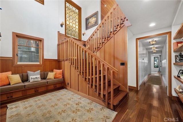 624 6th St, Manhattan Beach, CA 90266 - staircase featuring wood finished floors, a wainscoted wall, and recessed lighting