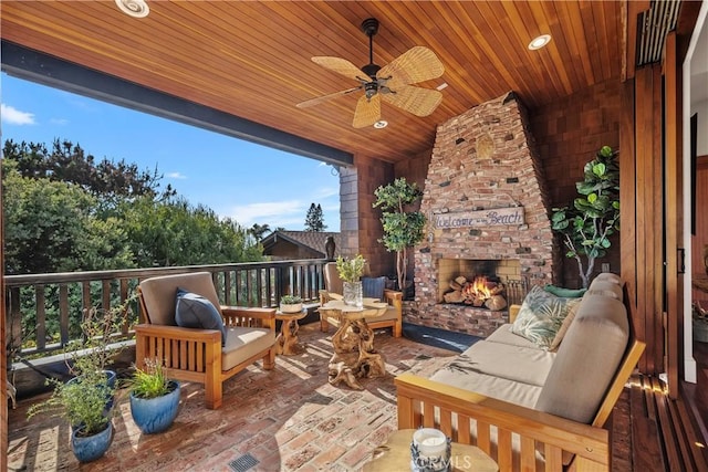 624 6th St, Manhattan Beach, CA 90266 - wooden deck featuring an outdoor living space with a fireplace, ceiling fan, and a patio area