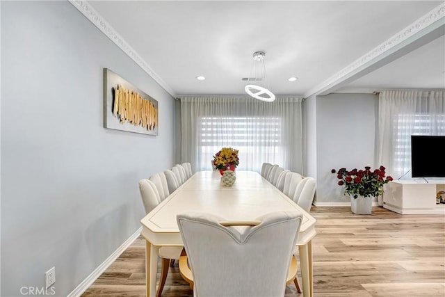 518 Hawthorne St, Glendale, CA 91204 - dining room with light wood-style flooring, baseboards, crown molding, and recessed lighting