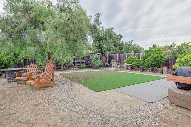 123 N Hayden Dr, Escondido, CA 92027 - fenced backyard with a patio area