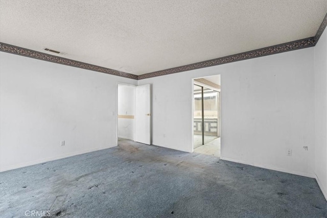 895 Huston Dr, Riverside, CA 92507 - carpeted empty room featuring a textured ceiling and ornamental molding