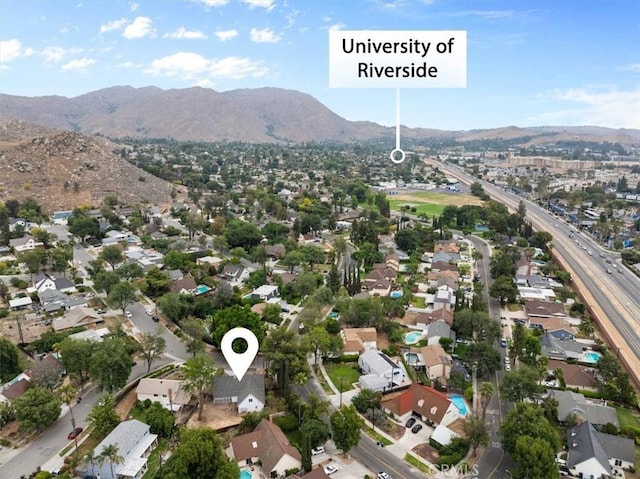 895 Huston Dr, Riverside, CA 92507 - aerial view of property and surrounding area featuring a mountain backdrop and nearby suburban area