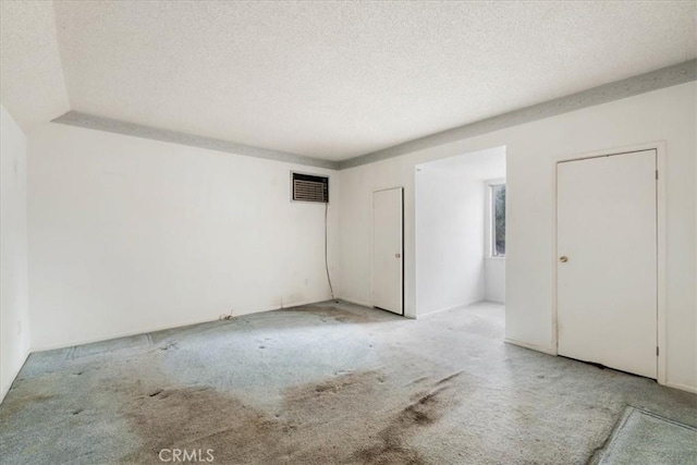 895 Huston Dr, Riverside, CA 92507 - unfurnished bedroom with carpet floors and a textured ceiling