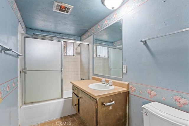 895 Huston Dr, Riverside, CA 92507 - full bath featuring vanity, toilet, and shower / bath combination with glass door