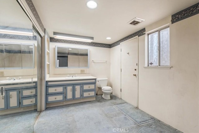 895 Huston Dr, Riverside, CA 92507 - bathroom with vanity, a shower stall, toilet, and recessed lighting
