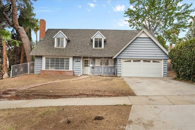895 Huston Dr, Riverside, CA 92507 - cape cod-style house featuring driveway, a chimney, a shingled roof, and a garage