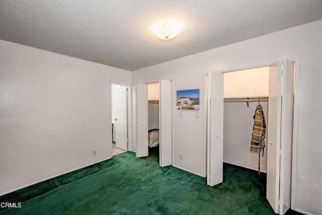 1139 N Heliotrope Dr, Los Angeles, CA 90029 - unfurnished bedroom with carpet flooring and multiple closets
