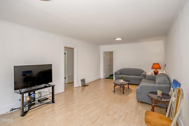 1139 N Heliotrope Dr, Los Angeles, CA 90029 - living area featuring light wood finished floors, ornamental molding, and baseboards