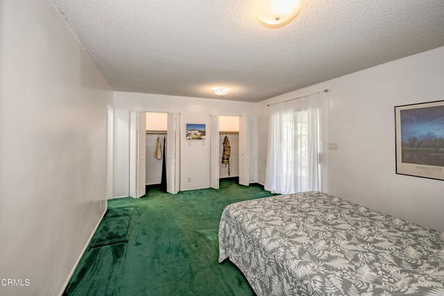 1139 N Heliotrope Dr, Los Angeles, CA 90029 - carpeted bedroom featuring a textured ceiling