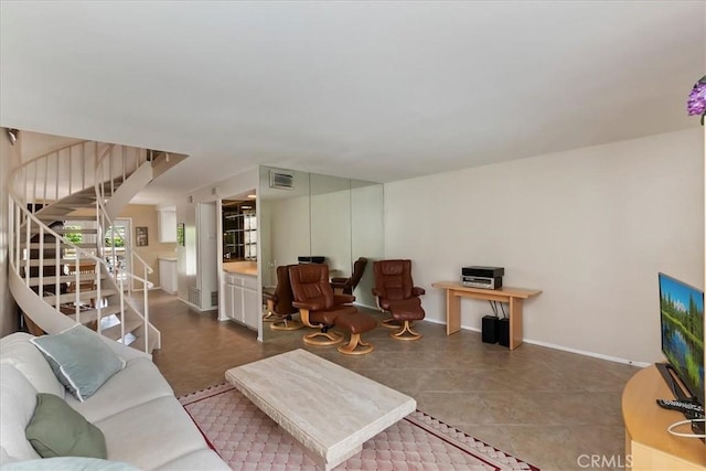 72864 Roy Emerson Ln, Palm Desert, CA 92260 - living room with baseboards, stairway, and tile patterned flooring