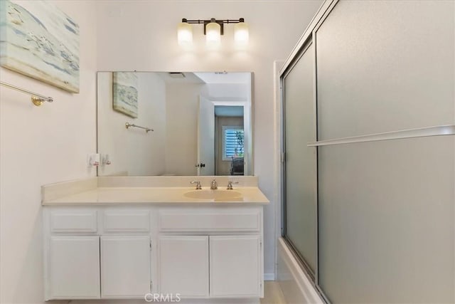 72864 Roy Emerson Ln, Palm Desert, CA 92260 - bathroom featuring a shower with door and vanity