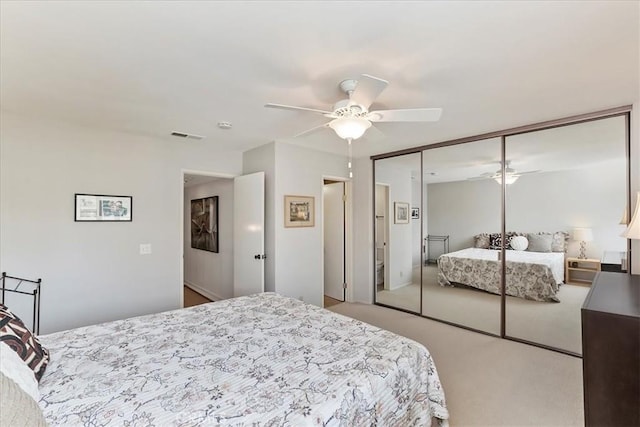 72864 Roy Emerson Ln, Palm Desert, CA 92260 - bedroom featuring carpet flooring, ceiling fan, and a closet