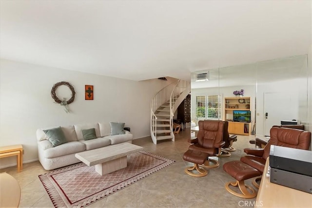 72864 Roy Emerson Ln, Palm Desert, CA 92260 - tiled living room featuring stairs