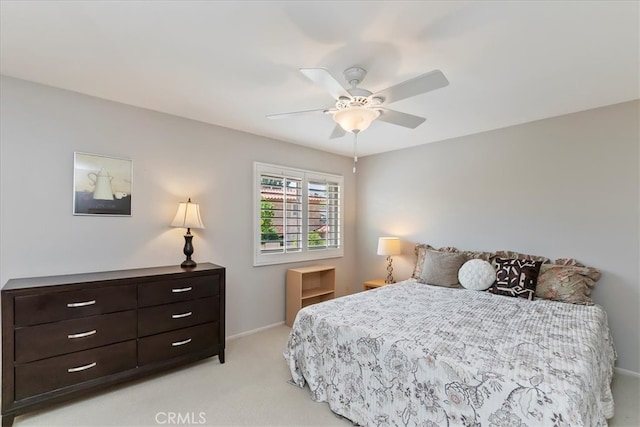 72864 Roy Emerson Ln, Palm Desert, CA 92260 - bedroom with light carpet, baseboards, and a ceiling fan