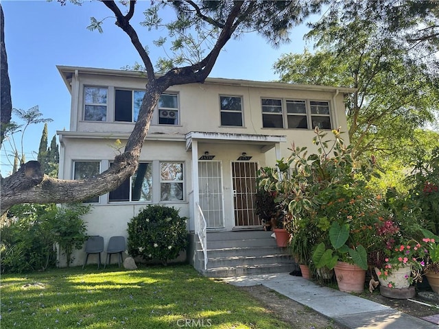 25352543 Cross St, La Crescenta, CA 91214 - view of front of home with stucco siding and a front lawn