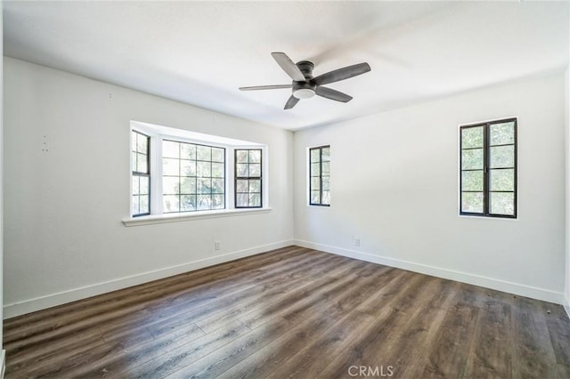 18675 La Ventana Rd, Murrieta, CA 92562 - unfurnished room with dark wood-style floors, baseboards, and ceiling fan