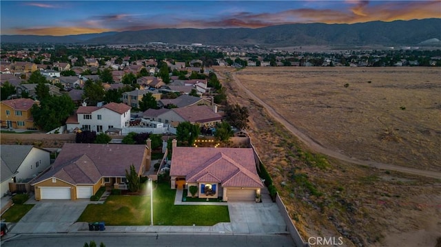 6662 W W Ave L4, Lancaster, CA 93536 - aerial perspective of suburban area with a mountain backdrop