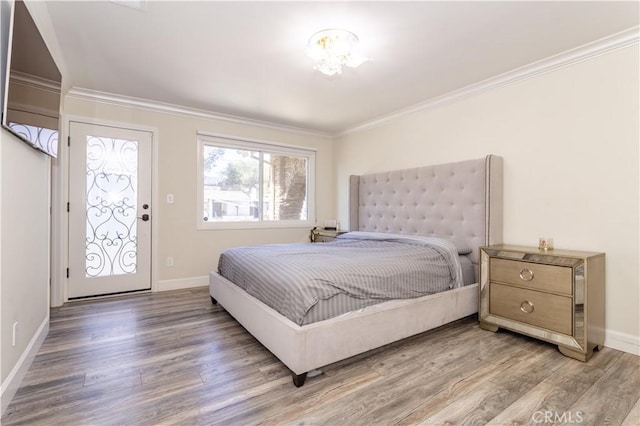 9434 Mclennan Ave, Northridge, CA 91343 - bedroom with wood finished floors, baseboards, and crown molding