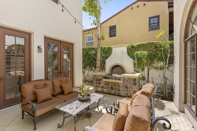 13335 Seagrove St, Carmel Valley, CA 92130 - view of patio with french doors and an outdoor living space with a fireplace