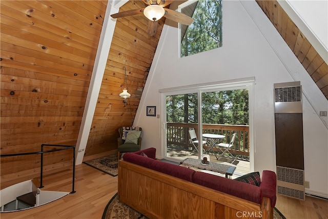 31115 All View Dr, Running Springs, CA 92382 - living area featuring a heating unit, light wood-style floors, high vaulted ceiling, and a ceiling fan