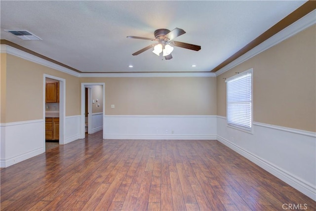 2001 5th St, Atwater, CA 95301 - spare room featuring ceiling fan, ornamental molding, wood finished floors, and recessed lighting