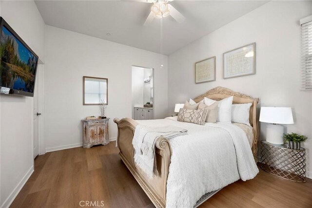 144 Borrego, Irvine, CA 92618 - bedroom featuring wood finished floors, baseboards, and a ceiling fan