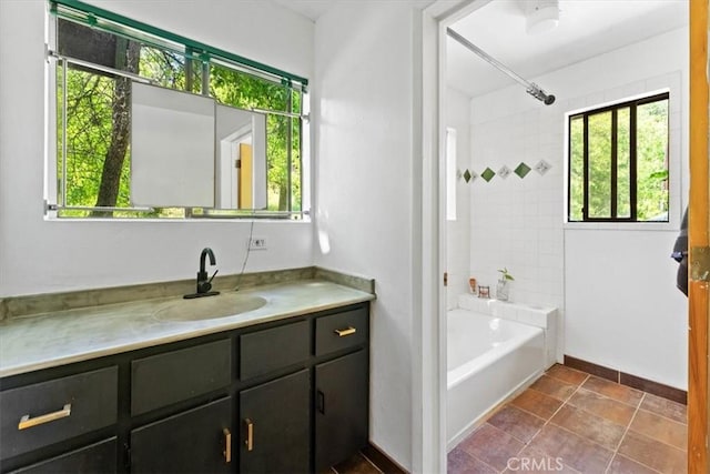 125 Cedar Gulch Rd, Hayfork, CA 96041 - full bath with vanity, shower / washtub combination, baseboards, and stone finish floors