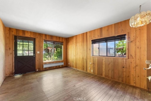 125 Cedar Gulch Rd, Hayfork, CA 96041 - foyer entrance featuring baseboard heating, hardwood / wood-style flooring, and wood walls