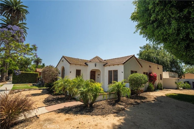 2691 Golden Ave, Long Beach, CA 90806 - mediterranean / spanish home featuring stucco siding and a tile roof