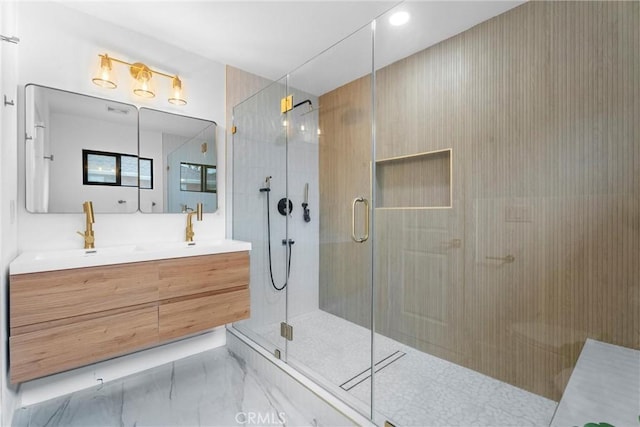 2220 Halladay St, Santa Ana, CA 92707 - bathroom with double vanity, a shower stall, marble finish flooring, and recessed lighting