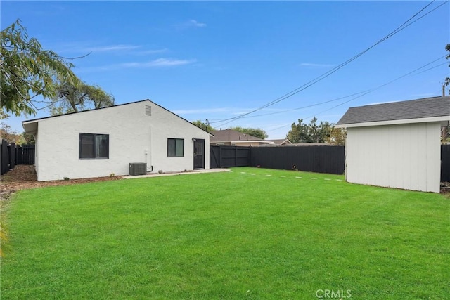 2220 Halladay St, Santa Ana, CA 92707 - back of property with an outdoor structure, central AC unit, and stucco siding