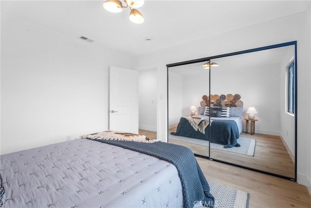 2220 Halladay St, Santa Ana, CA 92707 - bedroom featuring wood finished floors and a closet