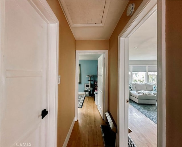 11304 Oklahoma Ave, South Gate, CA 90280 - corridor featuring wood finished floors and baseboards