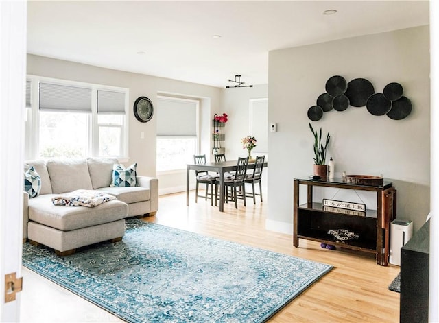 11304 Oklahoma Ave, South Gate, CA 90280 - living room featuring wood finished floors