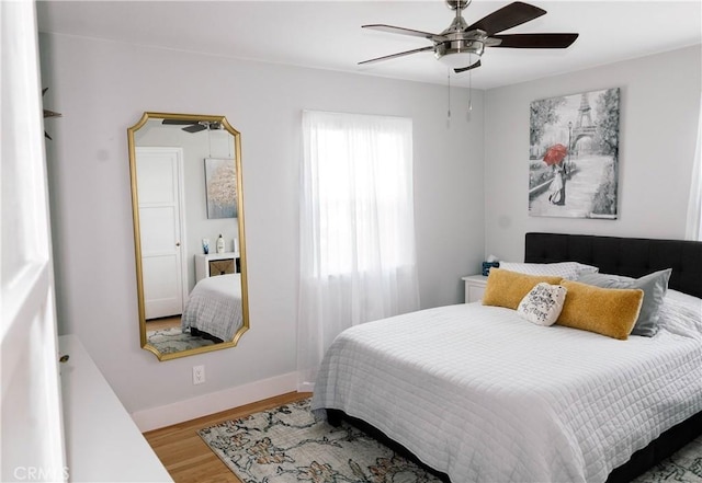 11304 Oklahoma Ave, South Gate, CA 90280 - bedroom with wood finished floors and a ceiling fan