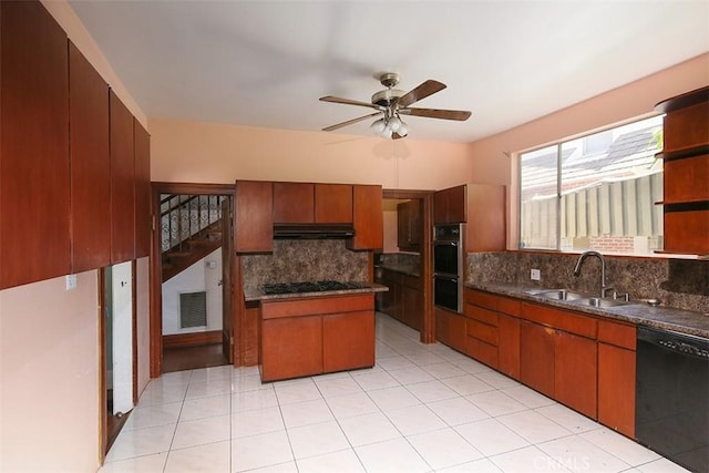 101 S Windsor Blvd, Los Angeles, CA 90004 - kitchen with black appliances, a sink, under cabinet range hood, decorative backsplash, and ceiling fan