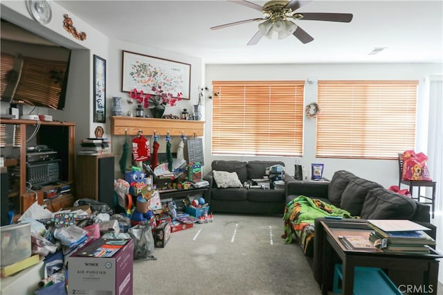 15541 Bow String St, Victorville, CA 92394 - living area with a ceiling fan and carpet floors