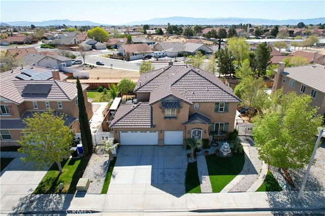 15541 Bow String St, Victorville, CA 92394 - aerial perspective of suburban area with a mountainous background