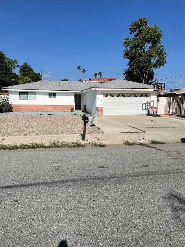 625 S Estudillo Ave, San Jacinto, CA 92583 - ranch-style home with an attached garage and driveway