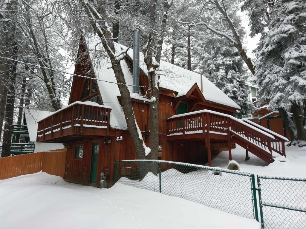 31450 Oceanview Dr, Running Springs, CA 92382 - snow covered house featuring a wooden deck