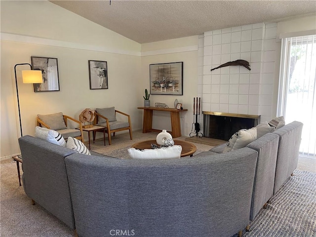 54858 Martinez Trl, Yucca Valley, CA 92284 - carpeted living room featuring lofted ceiling, a textured ceiling, and a fireplace